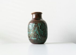 Customizing an Urn for a Loved One: Why and How to Do It a glass vase with a blue and green design