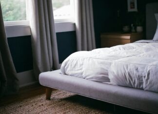 Essential Considerations for Choosing the Ideal Full-Size Mattress white bed by the window during daytime
