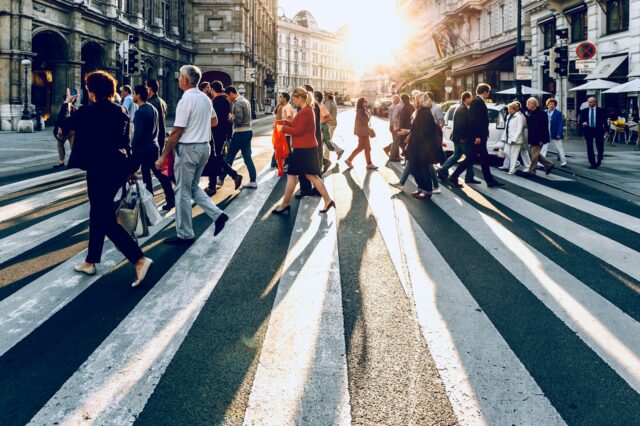Photo by Jacek Dylag group of people walking on pedestrian lane