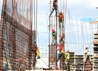 The Right Workers Compensation Attorney for Your Needs people working on building during daytime