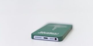 white iPhone 5 with case facing upside down