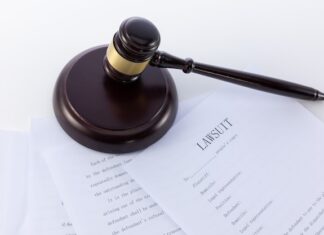 Behind the Scenes: How Process Server Services Streamline Legal Outcomes Closeup shot of the judge's gavel on a document of the lawsuit