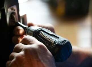 Home Warranty Repair Company Service in Your Neighborhood: A Comprehensive Guide selective focus photography blue and black Makita power drill