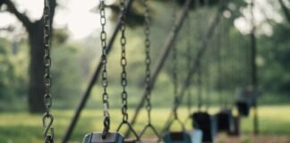selective focus shot of outdoor swing