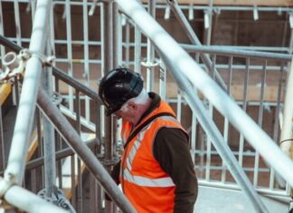How to Mentally Recover After a Workplace Accident man standing under scaffoldings