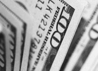 The Truth About ERC Advance and How It Benefits Businesses closeup photo of 100 US dollar banknotes