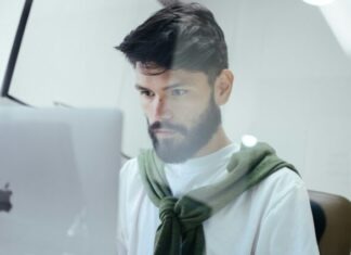 How Accountants Can Enhance Security for Clients man facing MacBook Pro