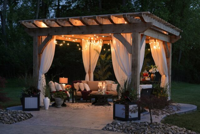 Photo by Randy Fath photo of gazebo with curtain and string lights