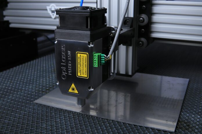Photo by Opt Lasers black and yellow labeled box