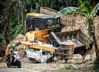 The Reason Dallas Truck Accidents Often End in Complicated Claims two people riding motorcycle looking at the excavator accident