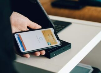 The Role of Business Credit Lines in Managing Daily Restaurant Expenses person holding black android smartphone