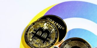 a pile of bitcoins sitting on top of each other