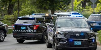 black mercedes benz suv on road during daytime