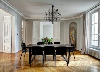 Interior Design for Rental Properties in Qatar: Attracting Tenants with Style brown wooden dining set inside room