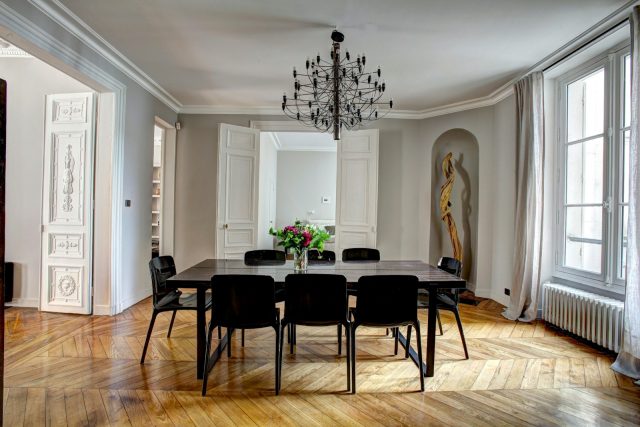 Photo by yann maignan brown wooden dining set inside room
