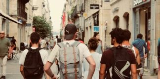 group of people walking on street during daytime