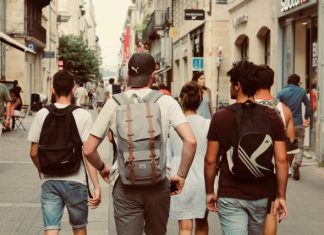 group of people walking on street during daytime