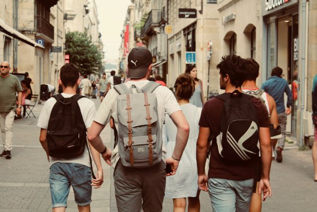 Photo by Rich Smith group of people walking on street during daytime