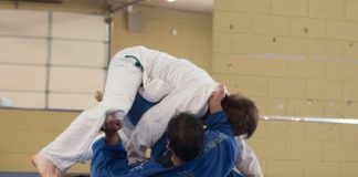 photo of two man wearing Taekwondo suit