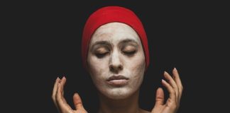 woman with red hijab on her head