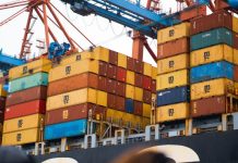 FUTURE EMPLOYMENT TRENDS IN THE UK SHIPPING INDUSTRY a large cargo ship loaded with lots of containers