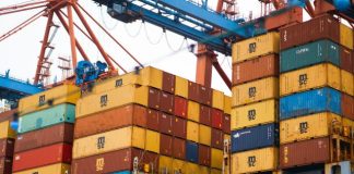 a large cargo ship loaded with lots of containers