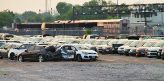 a parking lot filled with lots of parked cars
