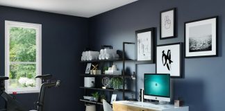 black flat screen computer monitor on brown wooden desk