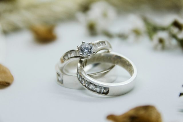 Photo by Kazzle John Delbo silver diamond ring on white surface