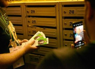 AI-Powered Visuals in Political Campaigns a man holding a bunch of money in front of a cell phone