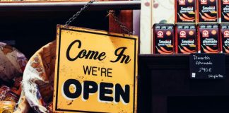 yellow and black come in we're open sign