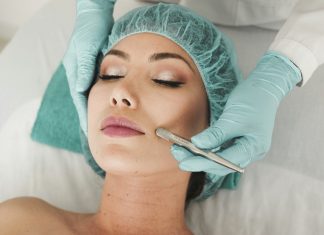 Say Goodbye to Dull Skin Forever With These Professional Skin Rejuvenation Treatments woman doing liposuction on her face