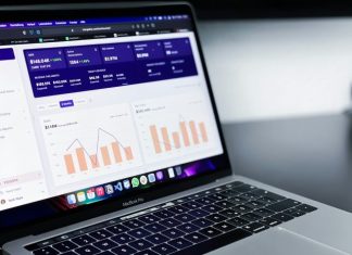 The Role of Data Analytics in Quality Management and Lean Six Sigma black and silver laptop computer