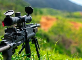 Red Dot vs. Rifle Scopes: Which Is Right for You? rules of third photography of sniper rifle