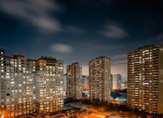 Emerging Concerns Around Developer Bankruptcy and Market Stability city skyline during night time