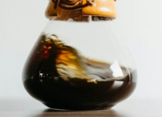 Why Decaf Coffee Deserves a Spot in Your Daily Routine clear glass jar with liquid