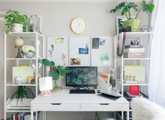 Creating Your Ideal Office Sanctuary: A Guide to Workspace Comfort and Productivity turned on flat screen monitor white wooden desk