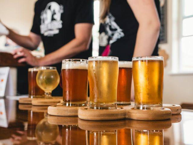 Photo by Meritt Thomas clear drinking glass with beer