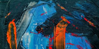blue, black, and orange abstract painting