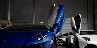 two white and blue Lamborghini vehicles inside garage