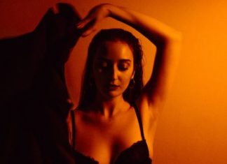 What Your Favorite Cam Performers Wish You Knew (But Won’t Say Out Loud) a woman in a bra posing for a picture