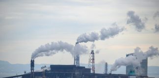 factory smoke coming out from factory