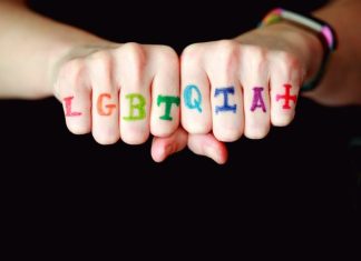 Late-Night Confessions and Digital Campfires: How Gay Chat Rooms Became the New Queer Hangouts person with blue and red manicure