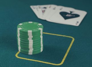 green poker chips on table
