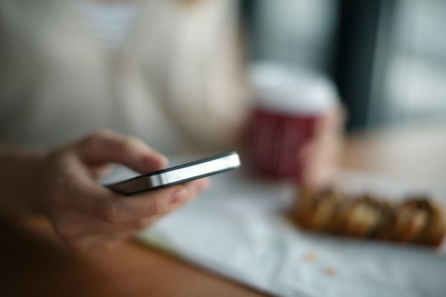 Photo by Andrej Lišakov selective focus photography of person holding gray phone