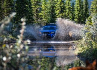 3 Reasons to Consider Adding a Performance Exhaust System to Your 4-Wheel Drive Vehicle blue car on road during daytime
