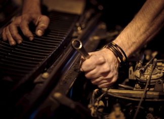 The Hidden Risk Behind DIY Body Repairs on Modern Vehicles grayscale photo of person playing piano