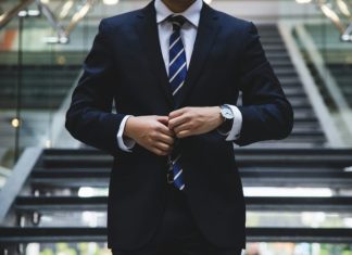 What Are the Signs of Employment Discrimination? person standing near the stairs