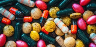 red and brown medication pill