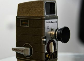 From Classic to Contemporary: The Evolution of Black and White Romance Cinema an old camera sitting on top of a table